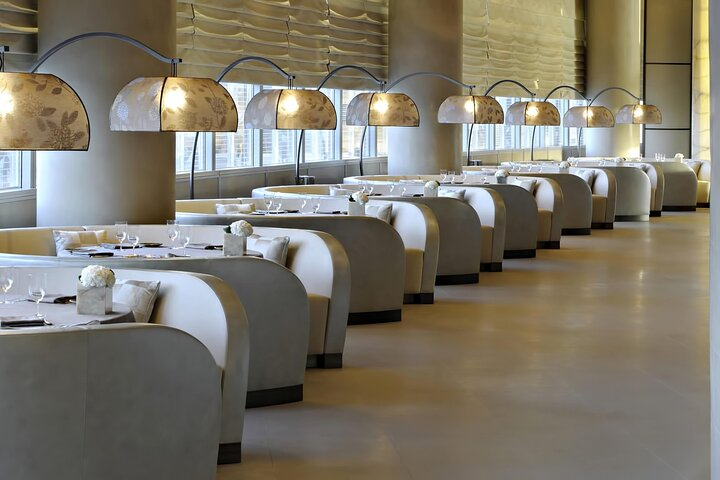 Experience stunning views from the Burj Khalifa while indulging in a delightful 3-course meal surrounded by elegant design and luxury on the 5th floor.